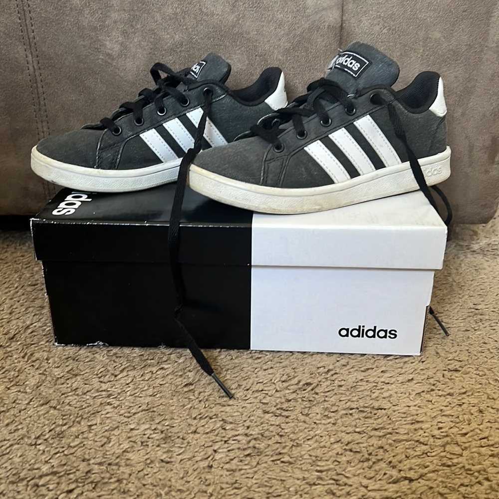Black and white adidas shoes